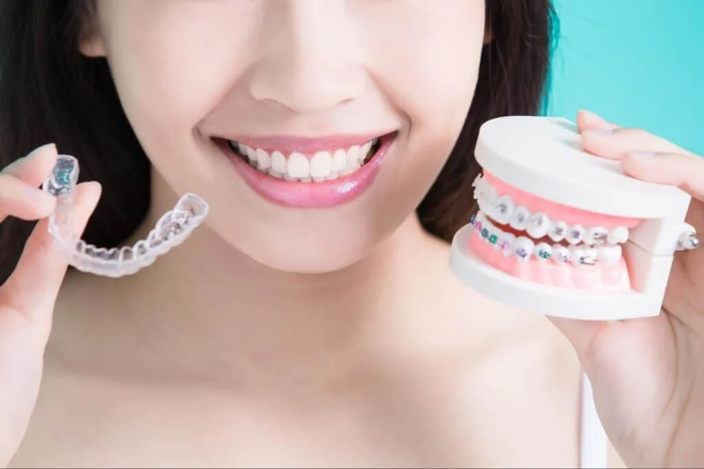 Adult patient comparing braces or Invisalign