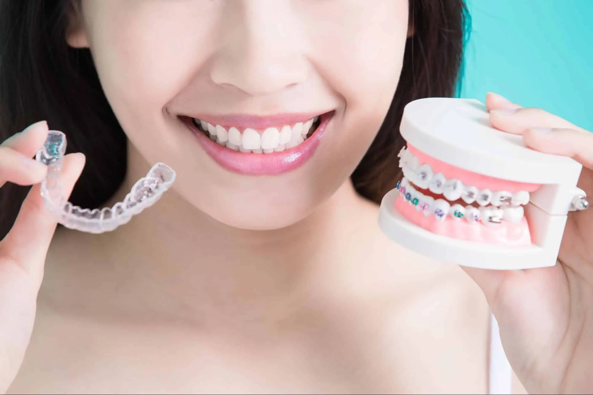 Adult patient comparing braces or Invisalign